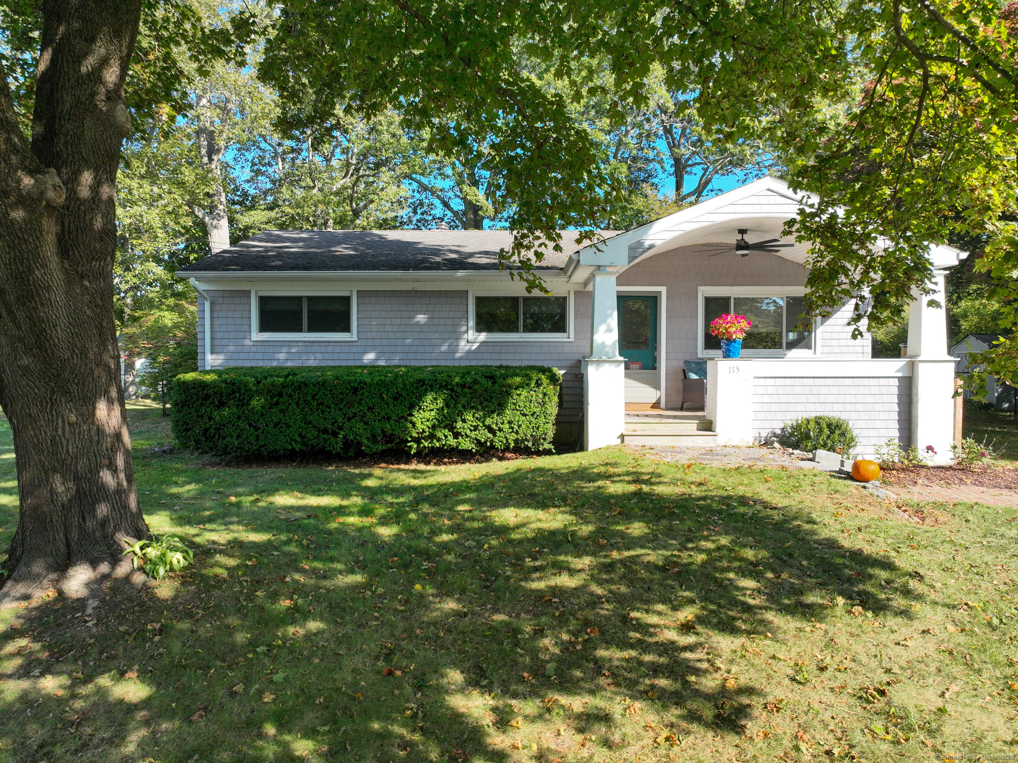 115 Lamphere Road Groton, CT 06355 - Photo 1 of 1 a front view of a house with a yard and garage
