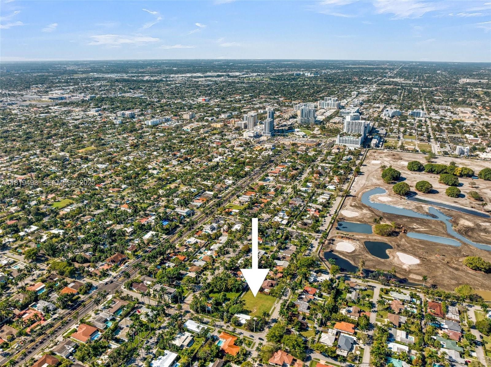 1310 Polk Street Hollywood, FL 33019 - Photo 22 of 31 an aerial view of residential building with parking space