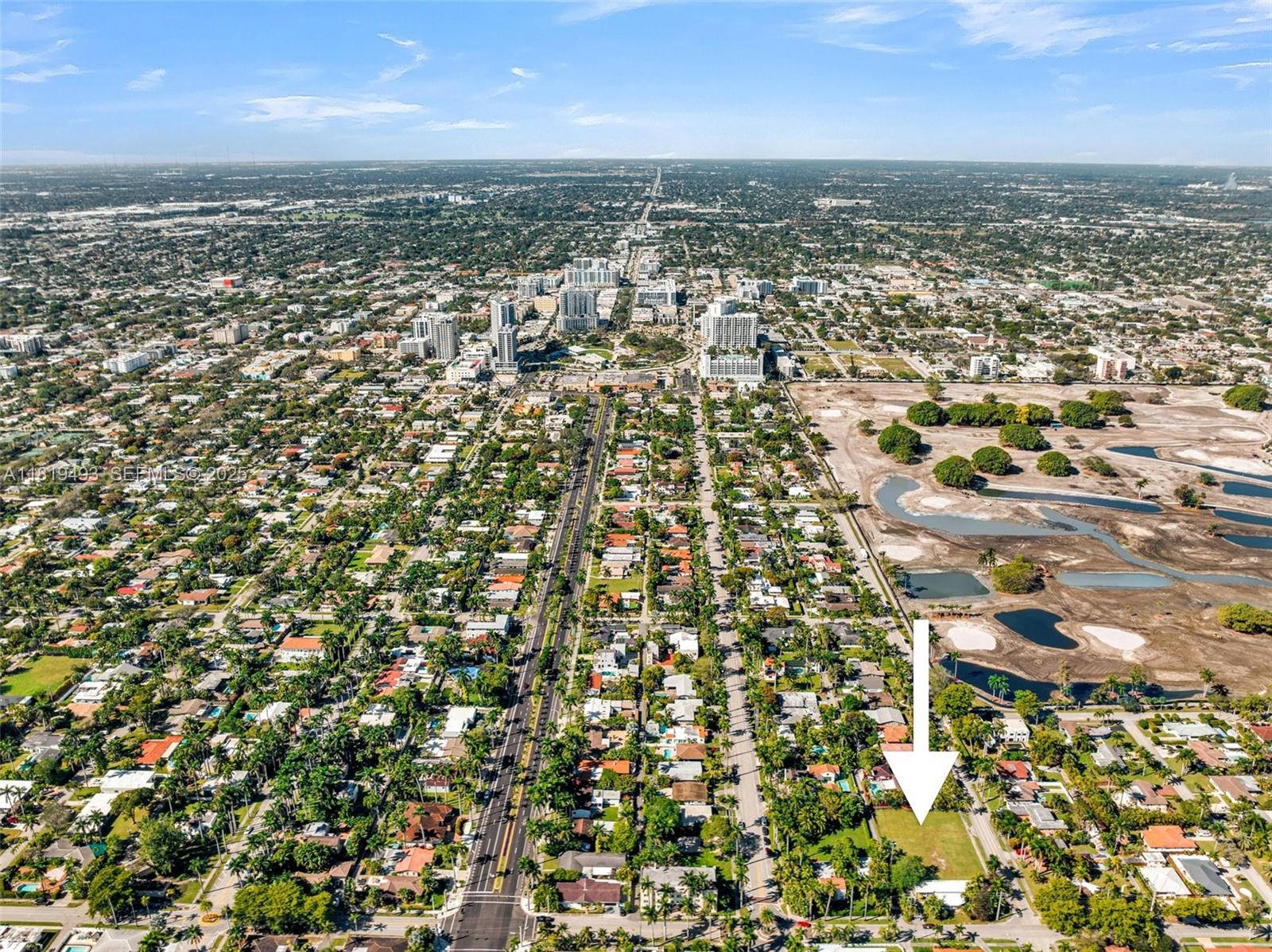 1310 Polk Street Hollywood, FL 33019 - Photo 24 of 31 an aerial view of residential building with parking space