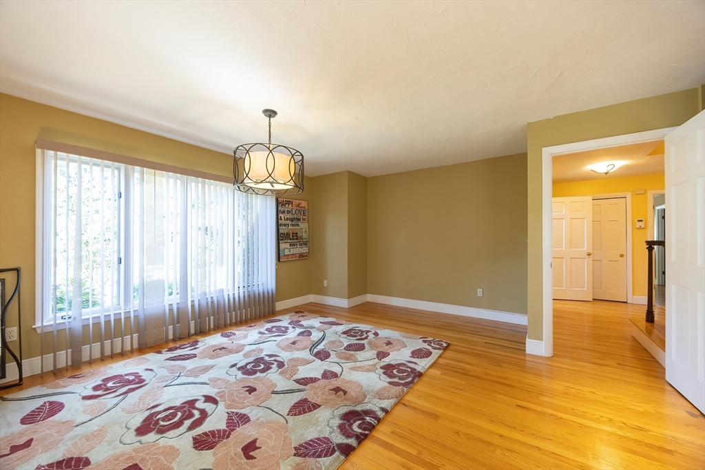 290 Central Avenue Milton, MA 02186 - Photo 11 of 40 a bedroom with a bed and a window