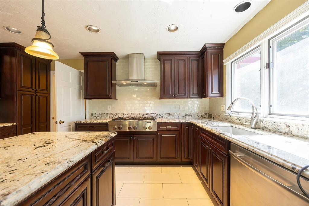 290 Central Avenue Milton, MA 02186 - Photo 15 of 40 a kitchen with a sink and a window
