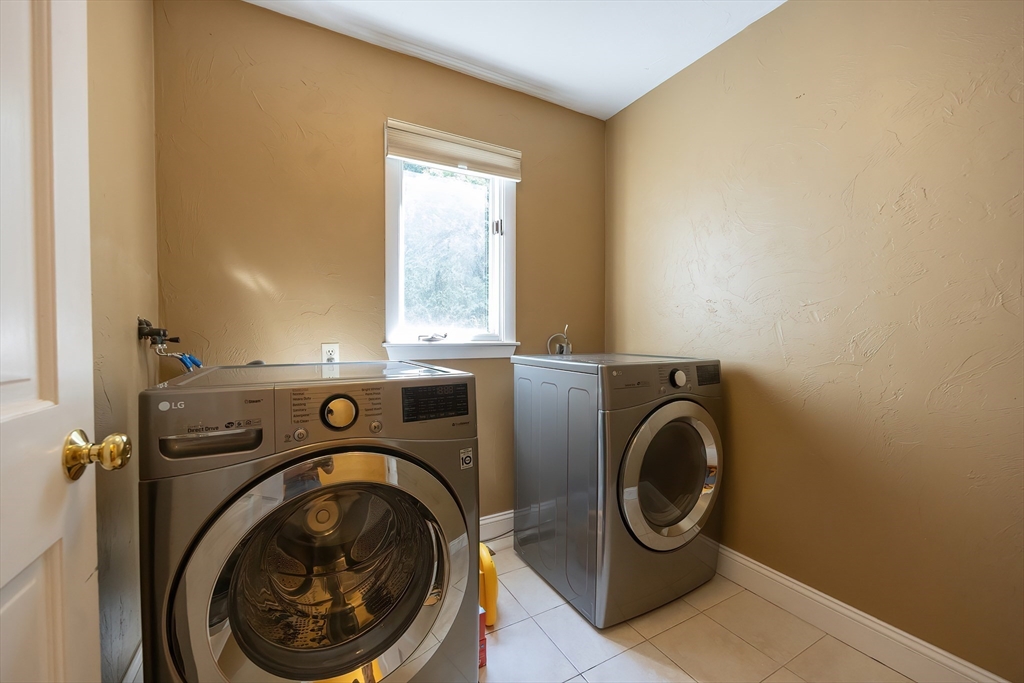 290 Central Avenue Milton, MA 02186 - Photo 18 of 40 a utility room with dryer and washer