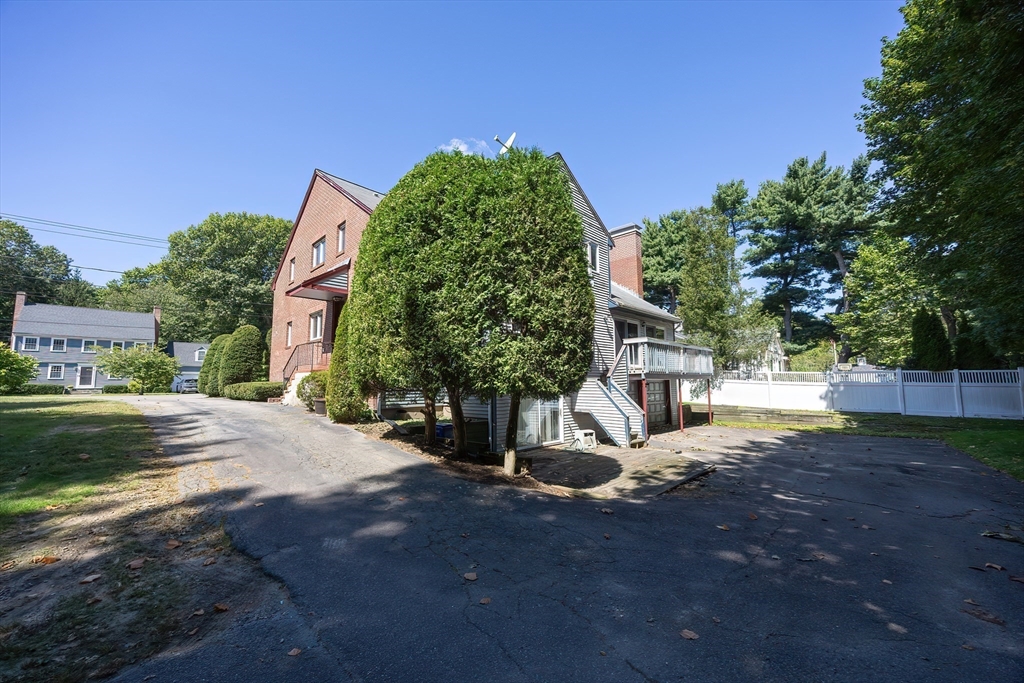 290 Central Avenue Milton, MA 02186 - Photo 36 of 40 a view of backyard with garden and entertaining space