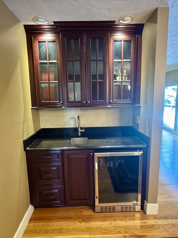 290 Central Avenue Milton, MA 02186 - Photo 10 of 40 a kitchen with a sink and a window