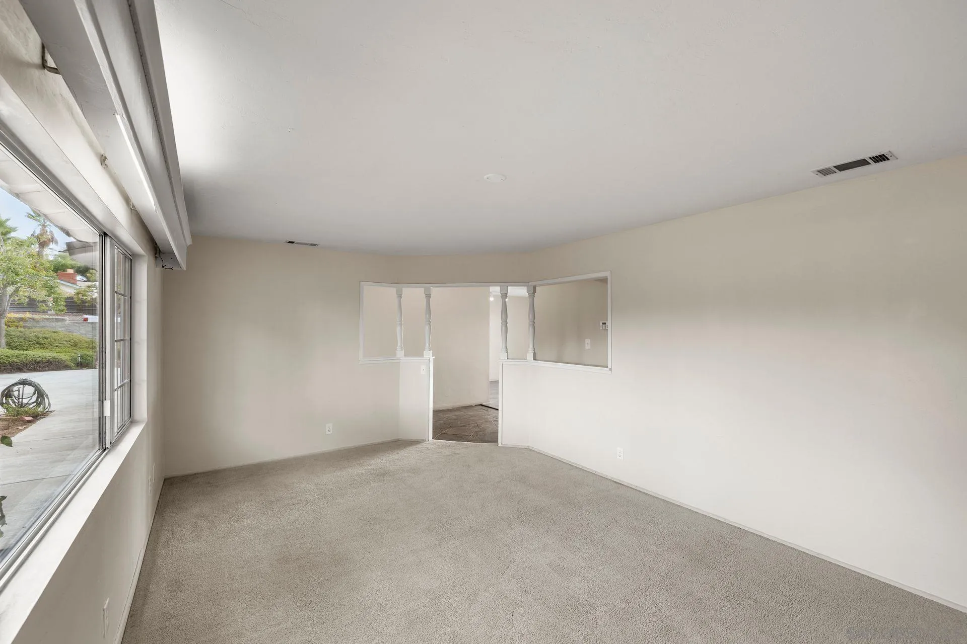 960 Sunset Drive Vista, CA 92081 - Photo 13 of 39 a view of an empty room with a window