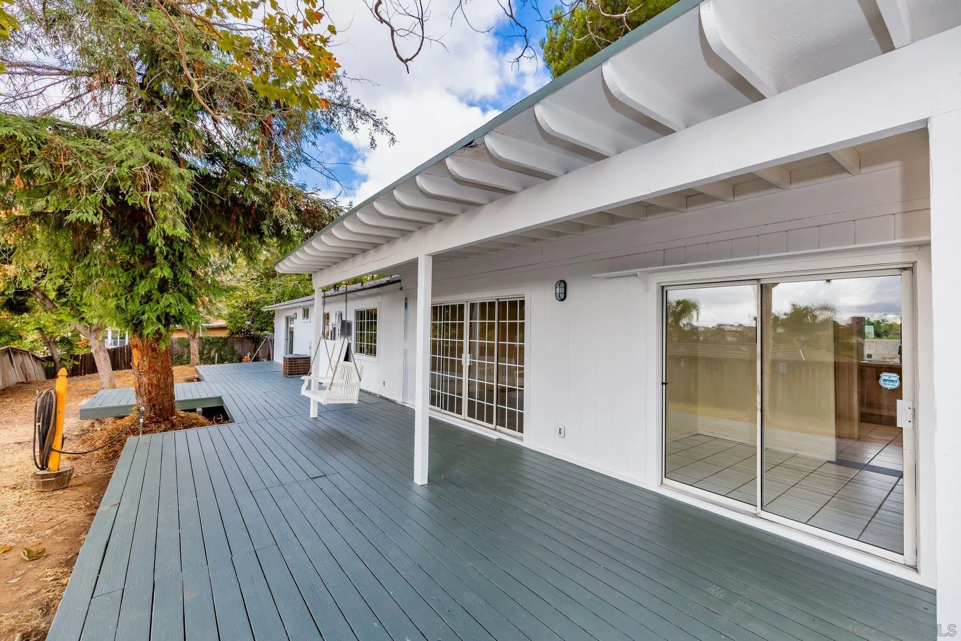 960 Sunset Drive Vista, CA 92081 - Photo 29 of 39 a view of a patio with wooden floor