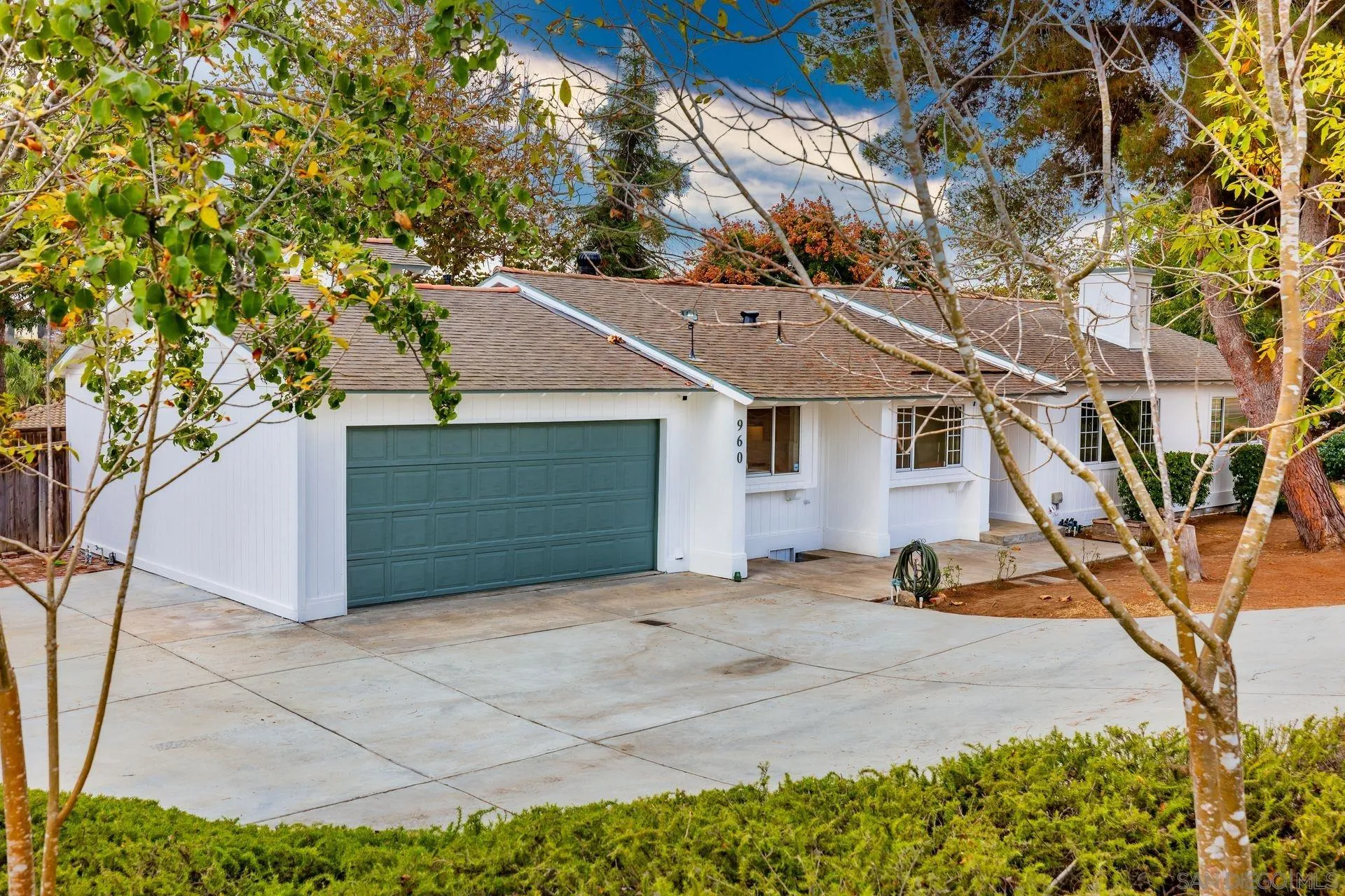 960 Sunset Drive Vista, CA 92081 - Photo 3 of 39 a view of a house with a tree