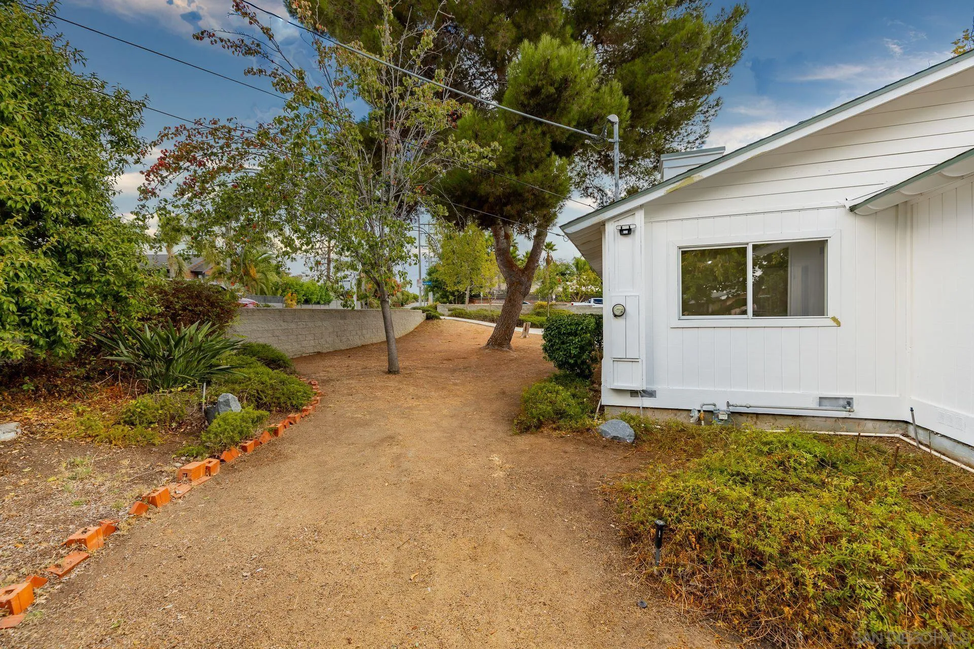 960 Sunset Drive Vista, CA 92081 - Photo 8 of 39 a view of a house with a backyard