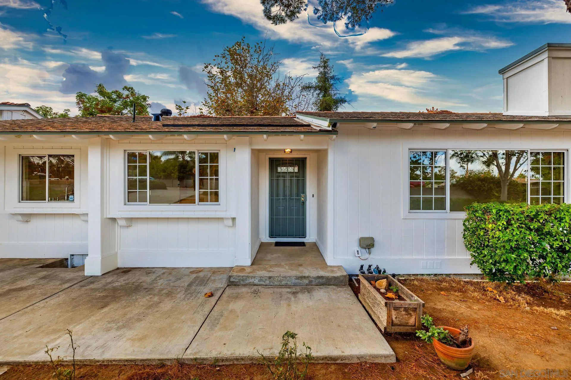 960 Sunset Drive Vista, CA 92081 - Photo 9 of 39 a view of a house with a backyard