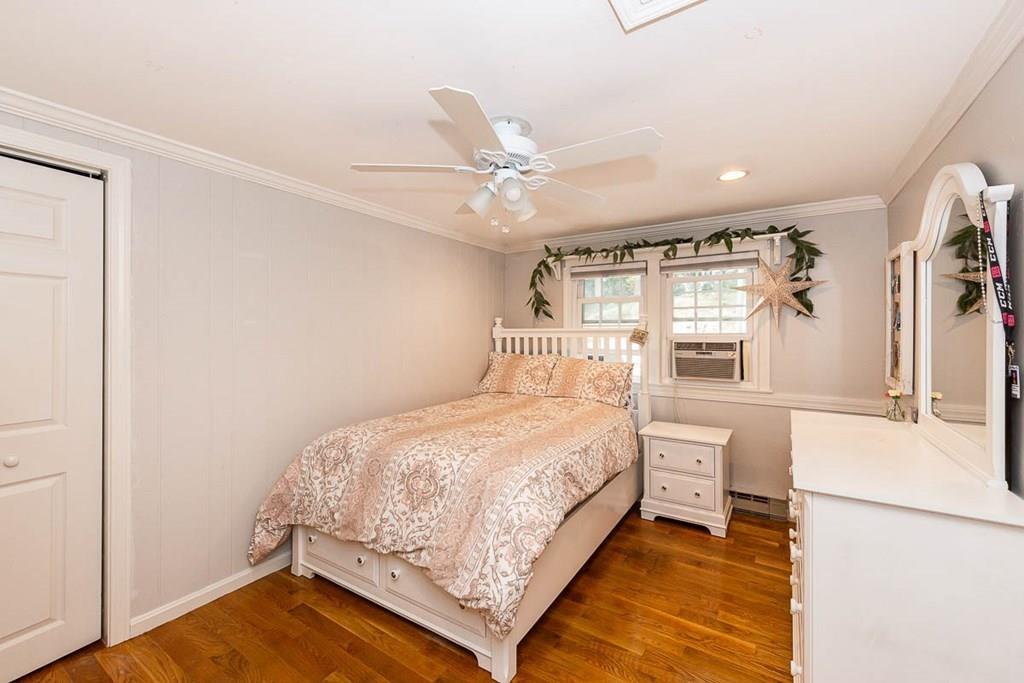 16 Boston Road Newbury, MA 01951 - Photo 16 of 30 a bedroom with a bed and a large window with outer view