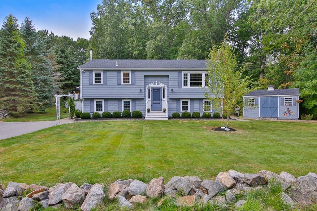 16 Boston Road Newbury, MA 01951 - Photo 2 of 30 a front view of a house with a garden and plants