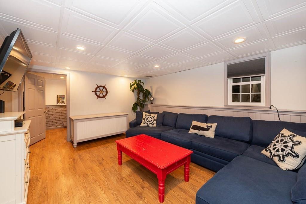 16 Boston Road Newbury, MA 01951 - Photo 21 of 30 a living room with furniture and a flat screen tv