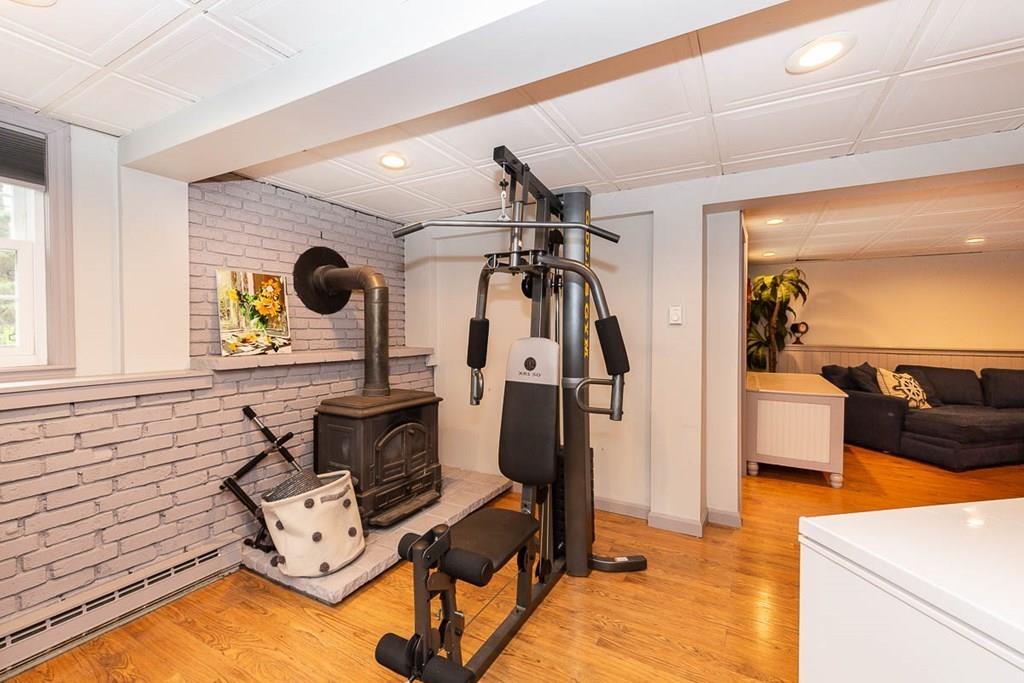 16 Boston Road Newbury, MA 01951 - Photo 23 of 30 a living room with furniture and a flat screen tv