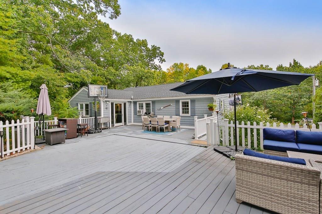 16 Boston Road Newbury, MA 01951 - Photo 27 of 30 a view of a patio with furniture and a yard