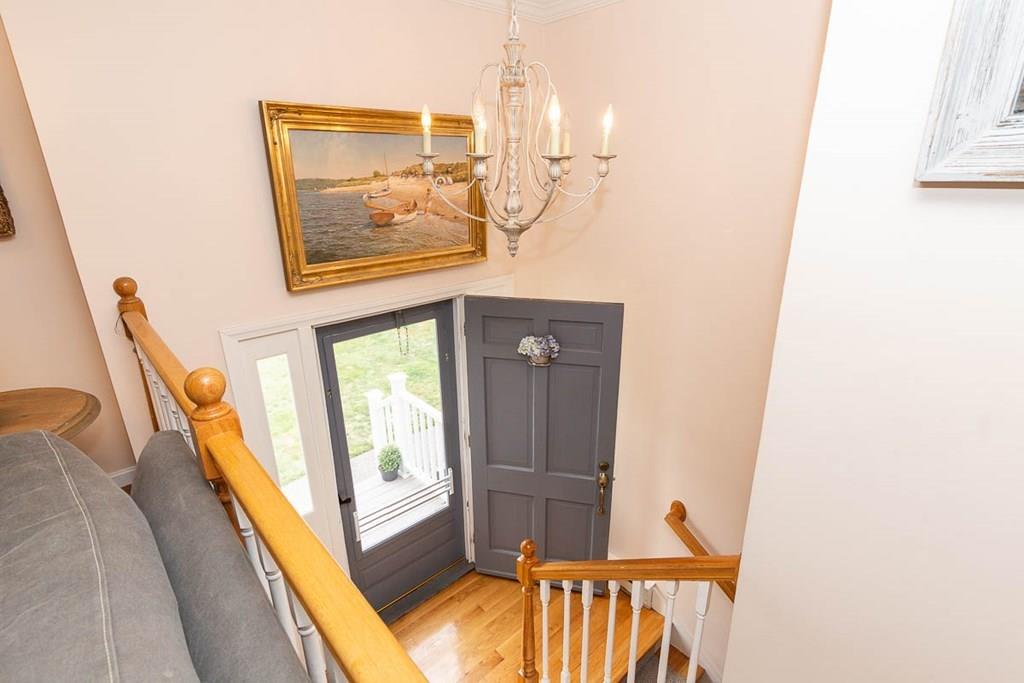 16 Boston Road Newbury, MA 01951 - Photo 3 of 30 a view of a balcony with furniture and front door
