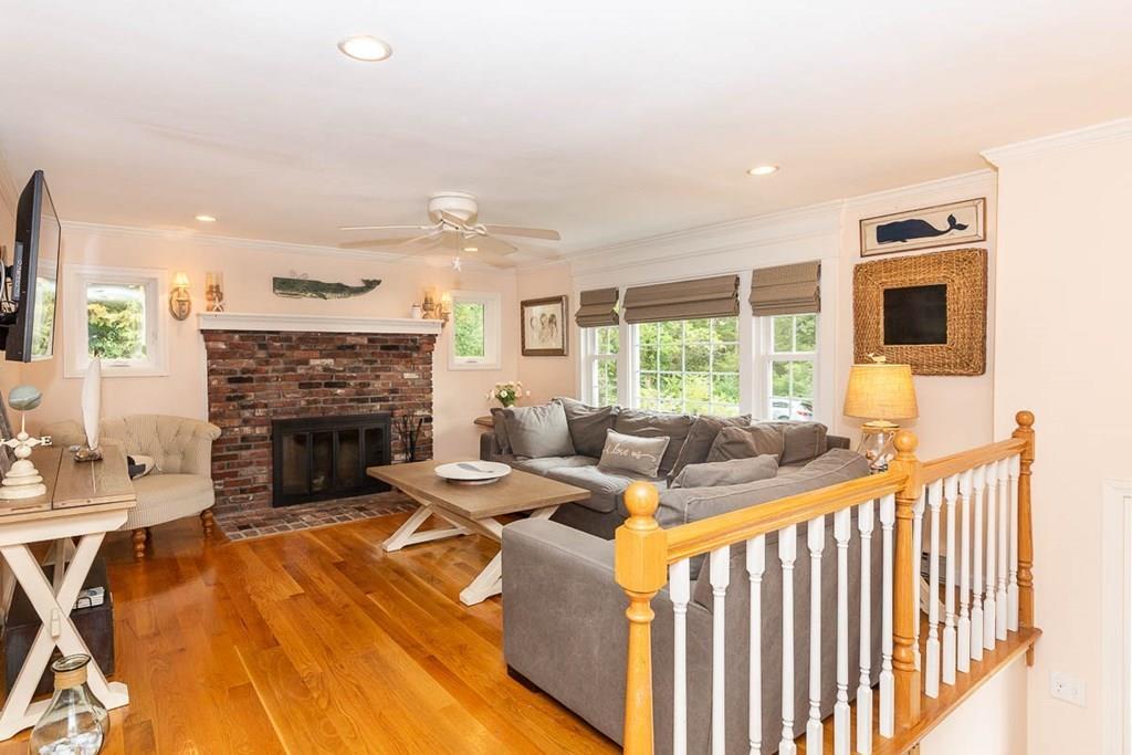 16 Boston Road Newbury, MA 01951 - Photo 5 of 30 a living room with furniture and a fireplace
