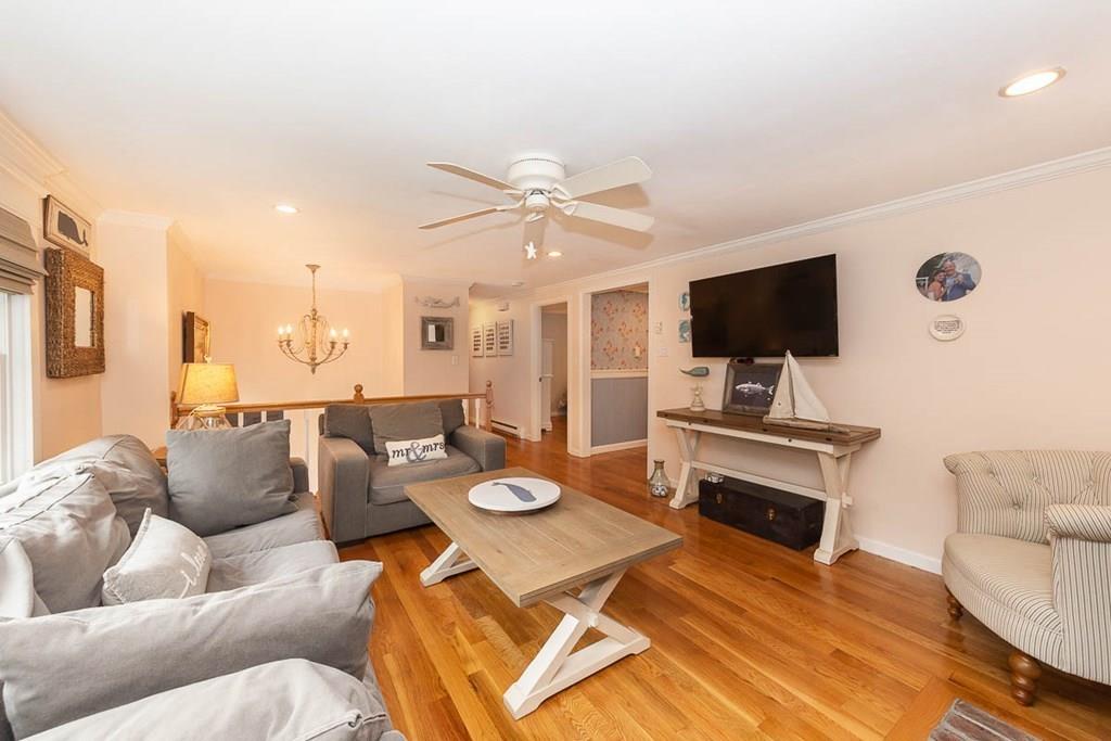 16 Boston Road Newbury, MA 01951 - Photo 6 of 30 a living room with furniture and a flat screen tv