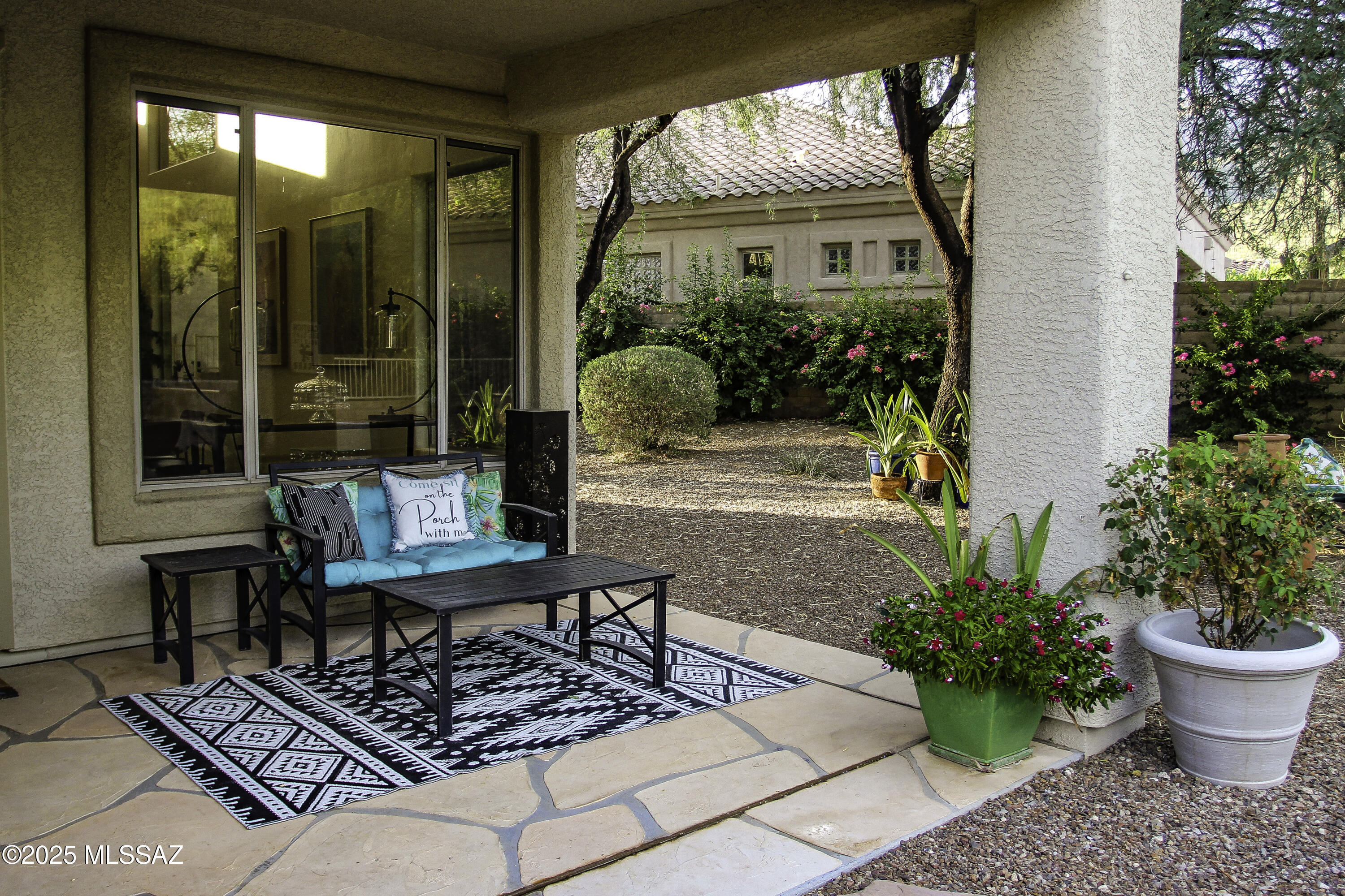 5202 Spring View Drive Tucson, AZ 85749 - Photo 35 of 49 a view of a porch with furniture and garden