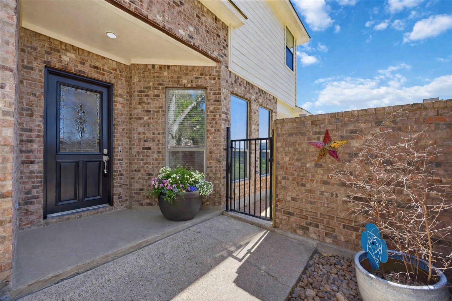 1930 Old River Road Montgomery, TX 77356 - Photo 5 of 49 A covered entryway on the side opens to a gorgeous interior.