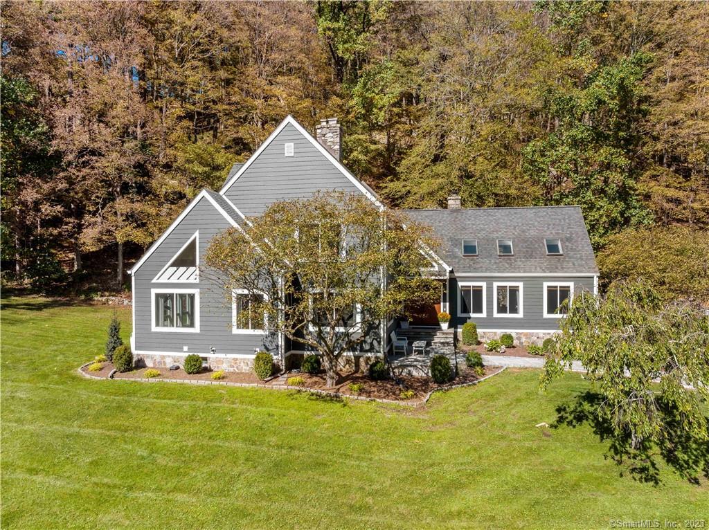 86 Old South Salem Road Ridgefield, CT 06877 - Photo 1 of 1 a front view of a house with a yard