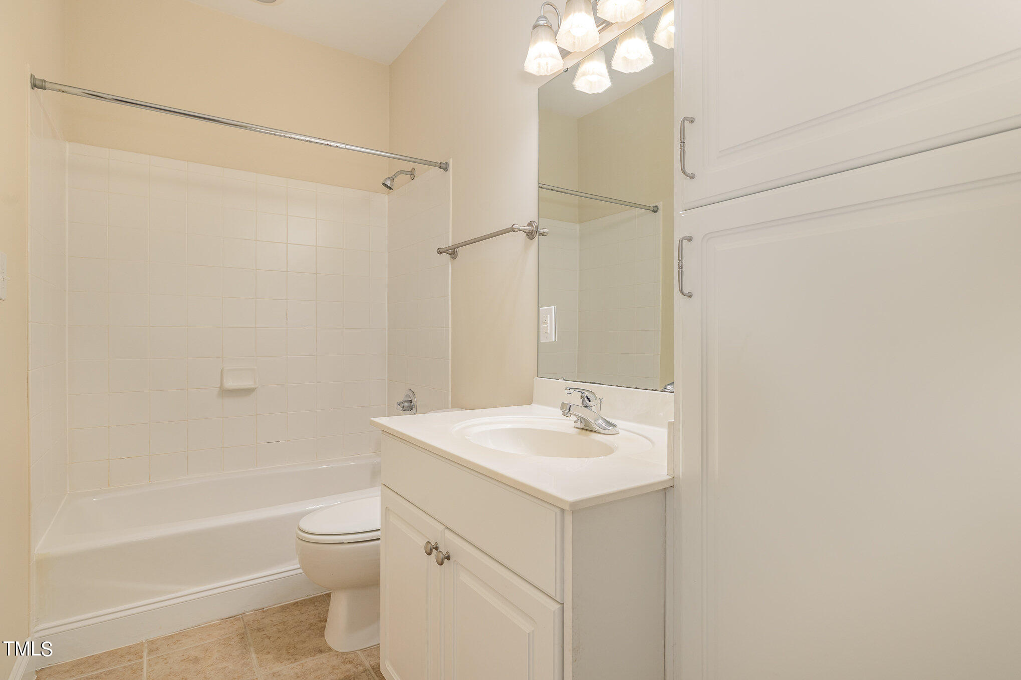 673 Highpark Lane Raleigh, NC 27608 - Photo 18 of 22 a bathroom with a sink a toilet and shower