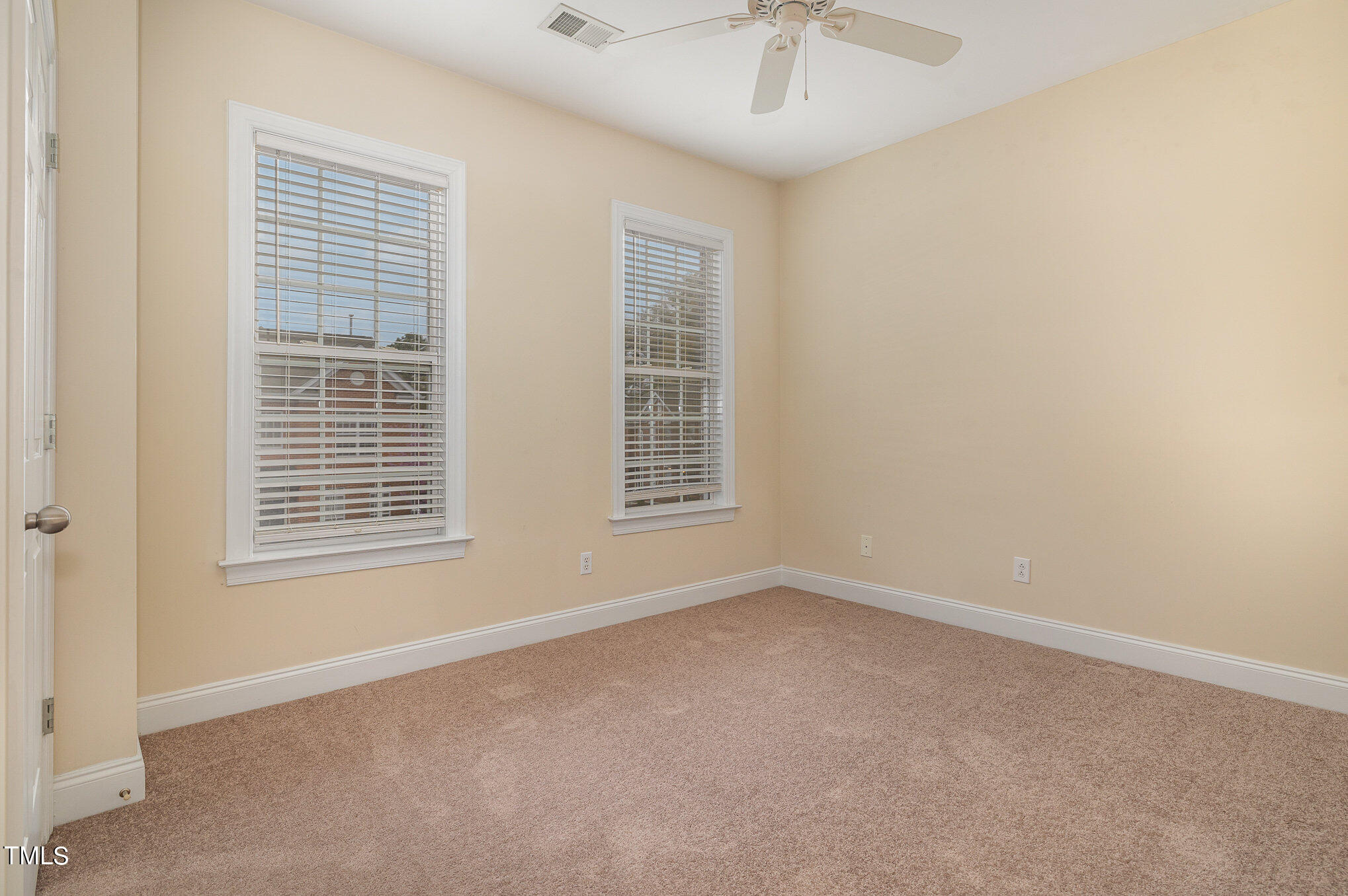 673 Highpark Lane Raleigh, NC 27608 - Photo 20 of 22 an empty room with a window