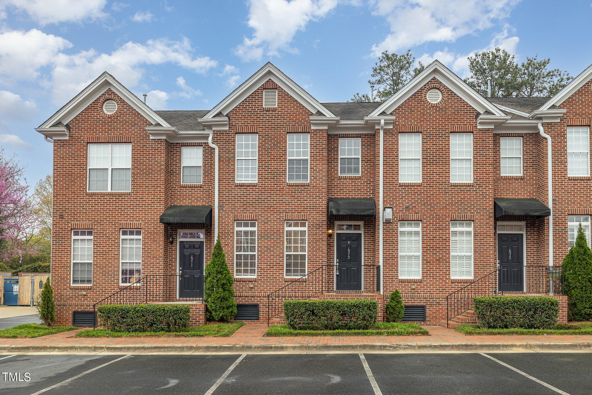 673 Highpark Lane Raleigh, NC 27608 - Photo 7 of 22 front view of a brick house