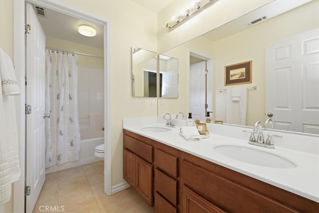 31249 Palomar Road Menifee, CA 92584 - Photo 10 of 21 Upstairs Hall Bathroom Dual Sinks, Privacy toilet/shower
