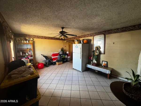 a view of a livingroom with furniture and windows