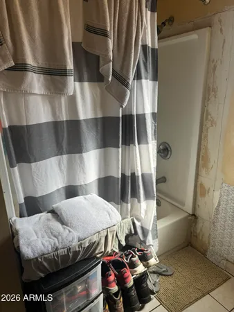 a bed room with a bed and a table