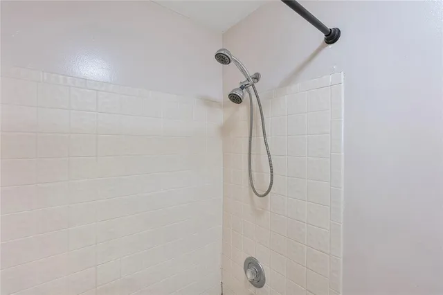 a bathroom with a bath tub