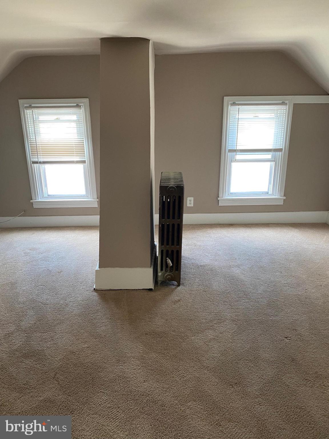 14 B Walnut Street Salem, NJ 08079 - Photo 13 of 14 an empty room with windows