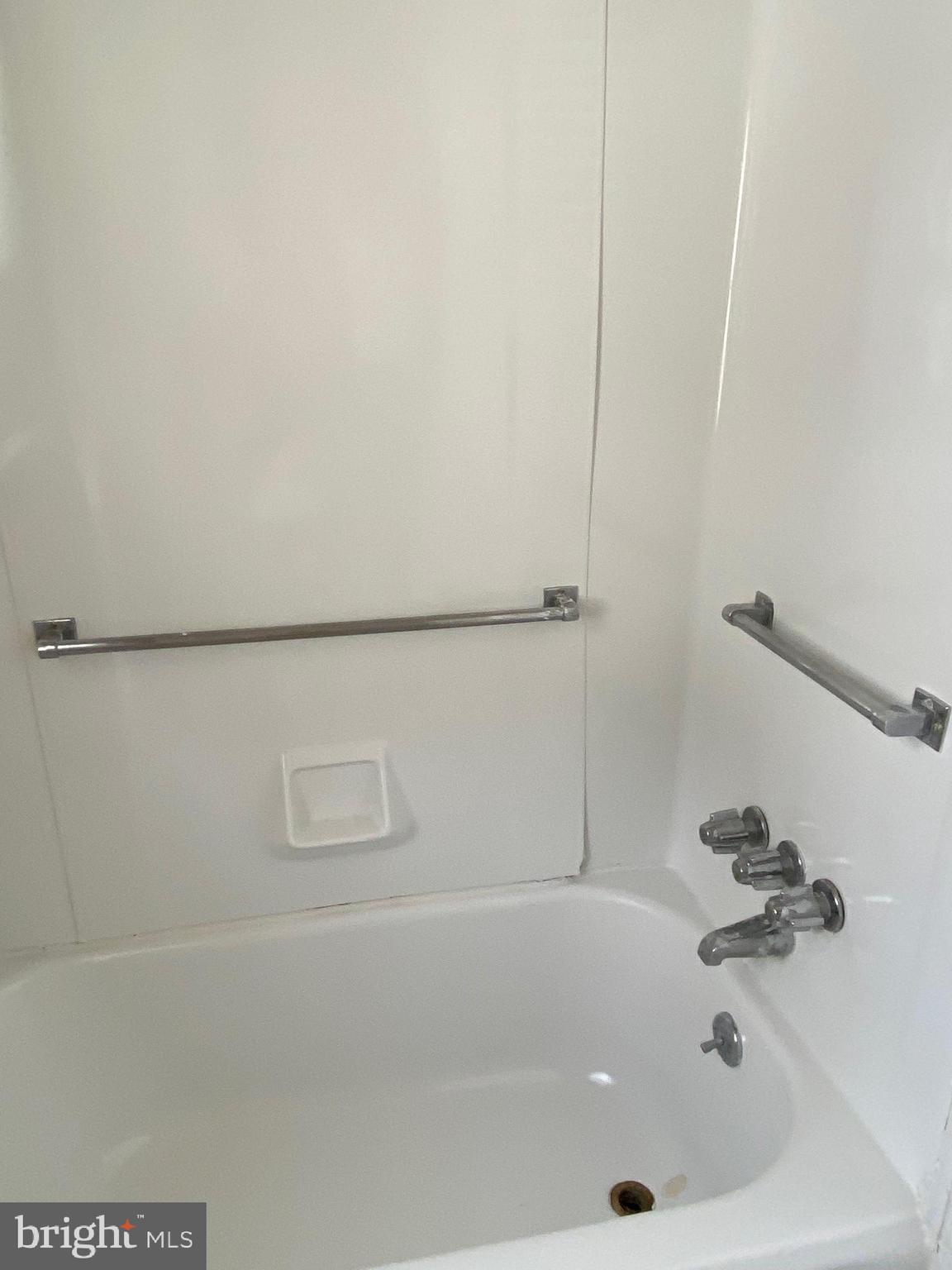 14 B Walnut Street Salem, NJ 08079 - Photo 9 of 14 a bathroom with a tub