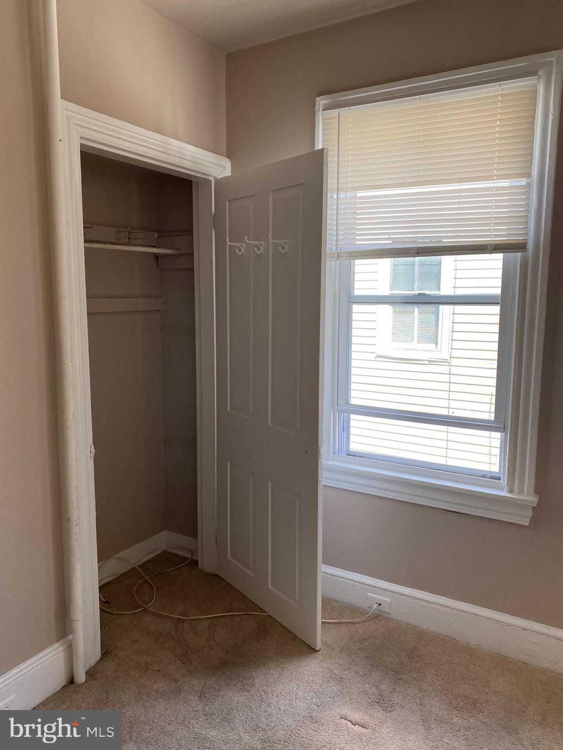14 B Walnut Street Salem, NJ 08079 - Photo 10 of 14 a view of an empty room with a window