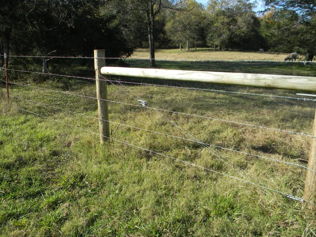 a view of a swimming pool with an outdoor space and seating area