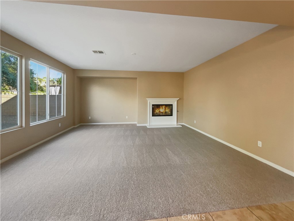 28872 Cedar Brook Lane Menifee, CA 92584 - Photo 12 of 26 a view of an empty room with a window