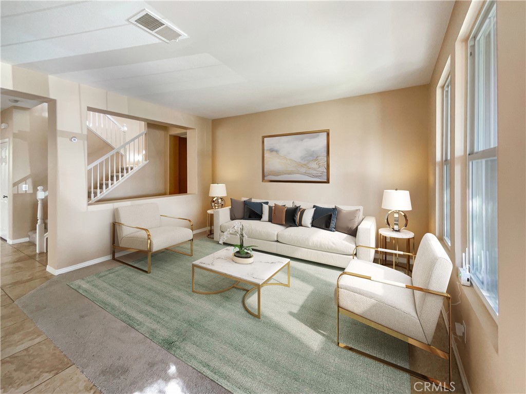 28872 Cedar Brook Lane Menifee, CA 92584 - Photo 2 of 26 a living room with furniture and a large window