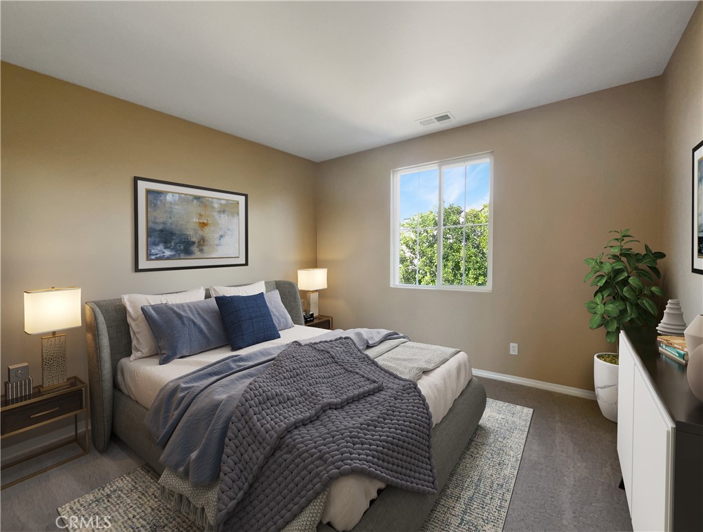 28872 Cedar Brook Lane Menifee, CA 92584 - Photo 4 of 26 a bedroom with a bed and a window