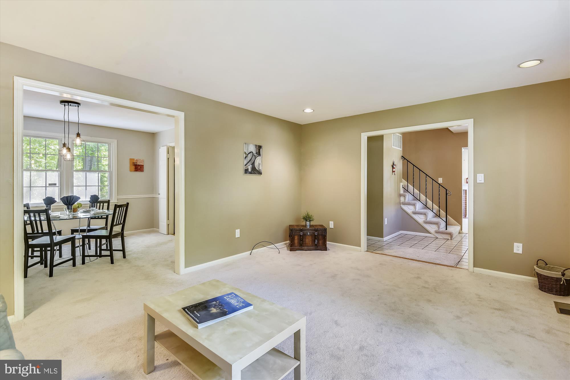 7403 Reservation Drive Springfield, VA 22153 - Photo 14 of 41 Living room with view of foyer and dining room