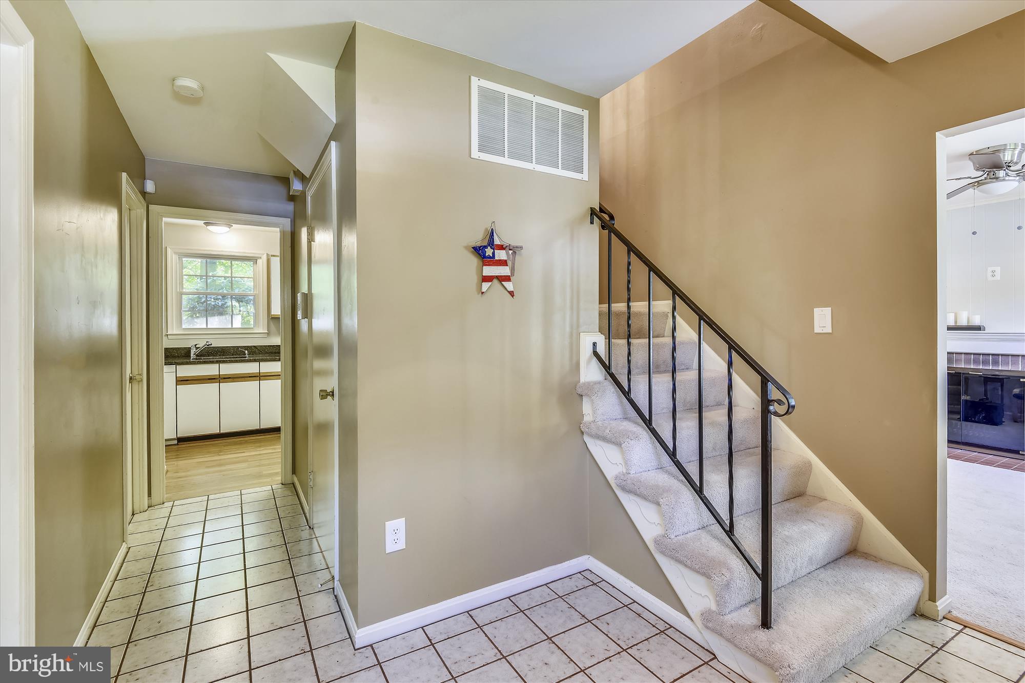 7403 Reservation Drive Springfield, VA 22153 - Photo 3 of 41 Foyer with stairs leading to upper level.