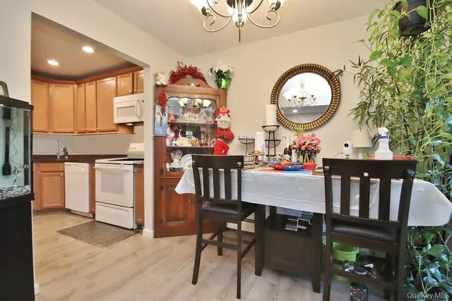 a view of a kitchen and dining room