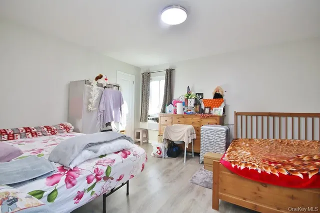 a bedroom with furniture and a bed