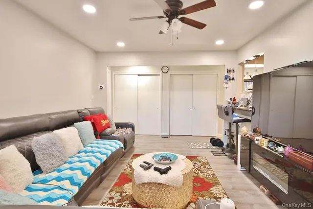 a living room with furniture and a rug