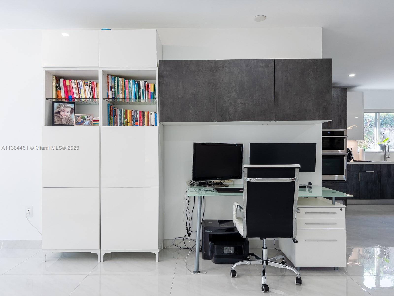 420 Southwest 18th Road Miami, FL 33129 - Photo 11 of 30 a view of a workspace with furniture
