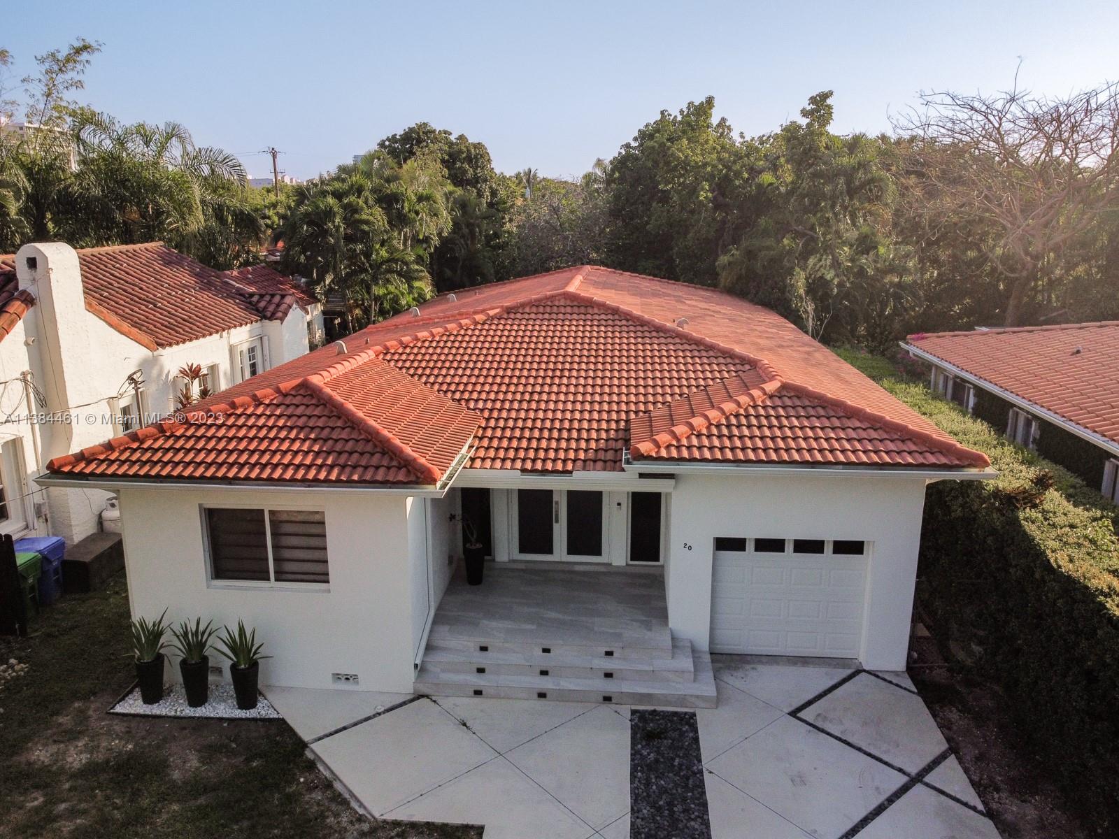 420 Southwest 18th Road Miami, FL 33129 - Photo 2 of 30 a front view of a house with garden