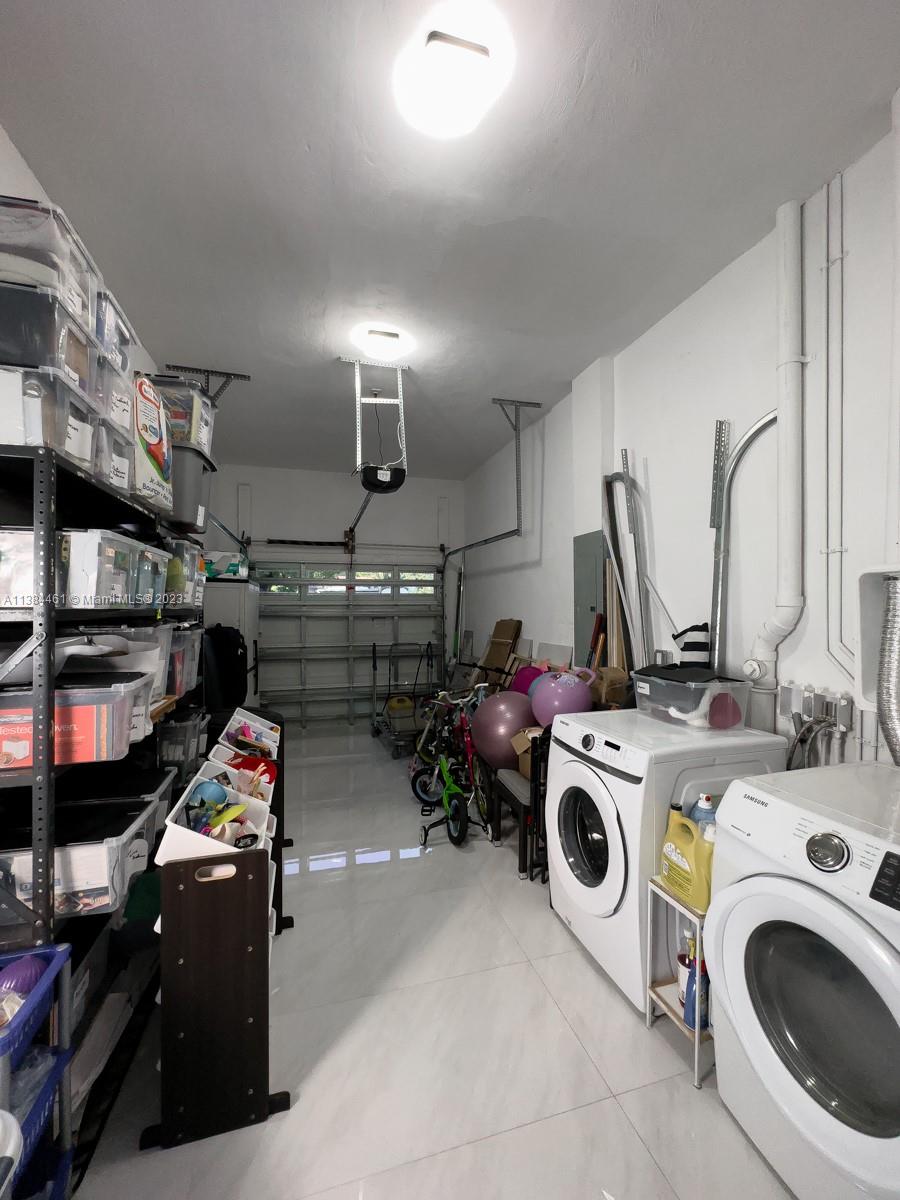 420 Southwest 18th Road Miami, FL 33129 - Photo 26 of 30 a storage room with washer and dryer