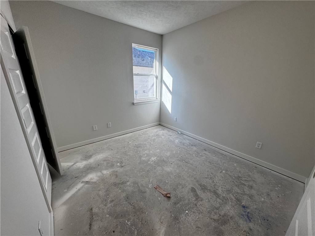 4756 Holm Oak Road Bryan, TX 77845 - Photo 13 of 13 a view of empty room with window