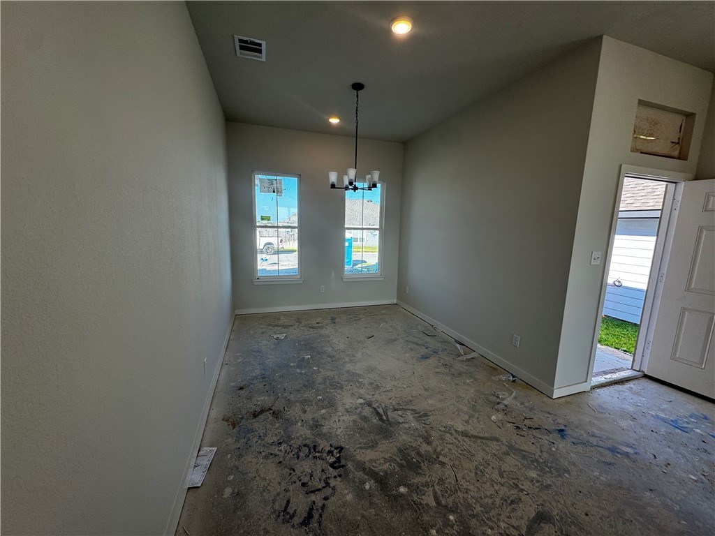 4756 Holm Oak Road Bryan, TX 77845 - Photo 5 of 13 an entryway in a room with windows and hallway