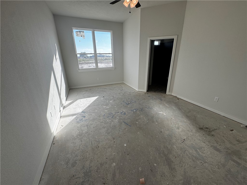 4756 Holm Oak Road Bryan, TX 77845 - Photo 7 of 13 an empty room with windows and closet