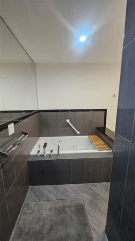 a view of bathroom with bathtub